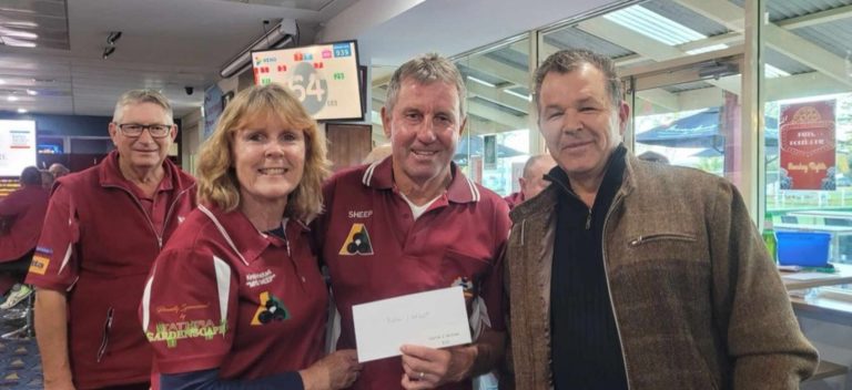 Stafford’s Hardware GM George Karmadonoff congratulating winners at the Stafford’s Bowls Competition, Tathra Beach Bowling Club.