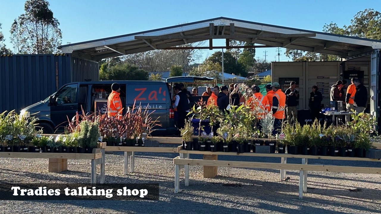 Local tradies in hi-vis catching up and checking out supplier displays at Stafford’s Kalaru Trade Brekkie event.